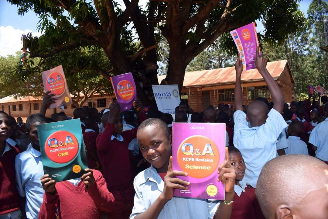 Students Receiving Books