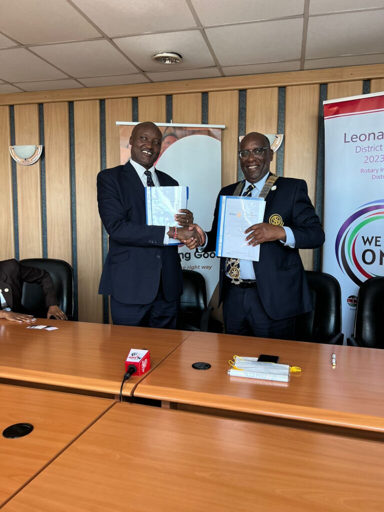 Rotary 9212 District Governor Leonard Ithau Signs MOU with Dr. John Chumo CEO Mama Doing Good